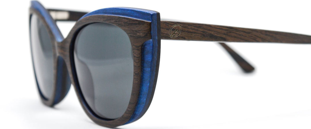 sideview of black oak and blue stained wood sunglasses.