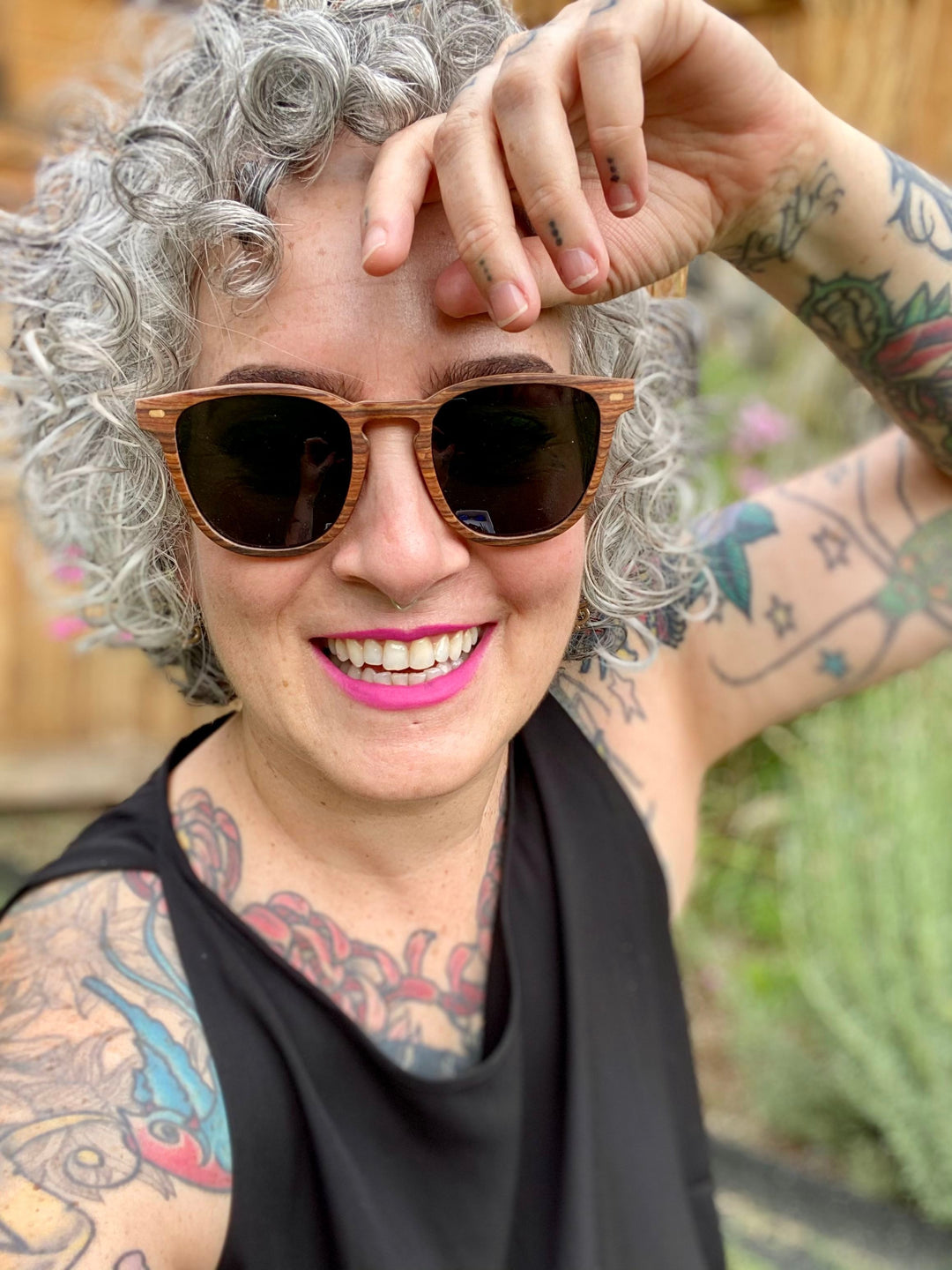 woman wearing rosewood sunglasses.