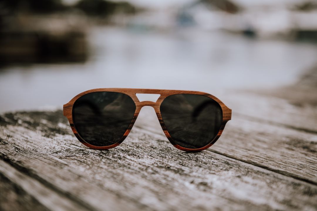 Langley wood sunglasses on the top of woman's head 