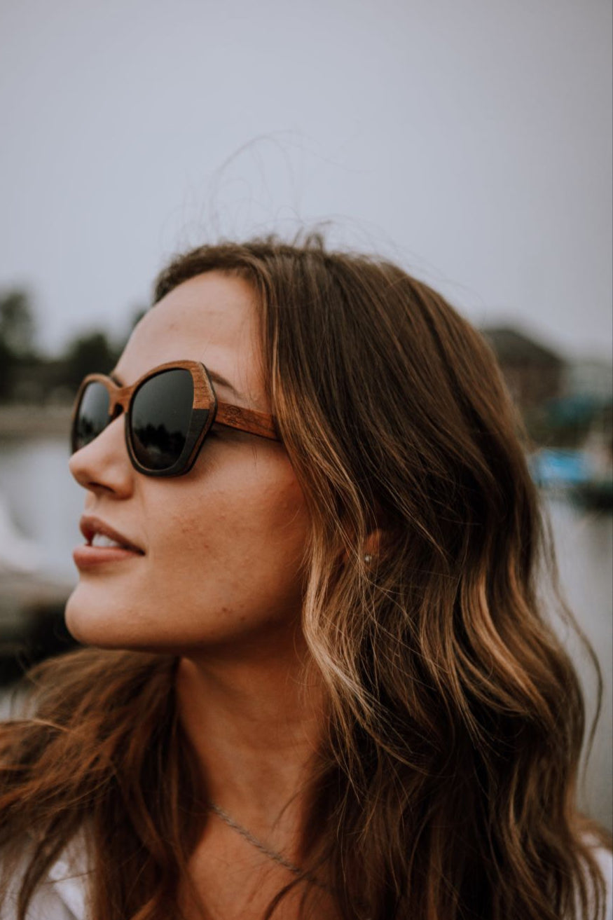 woman wearing wood sunglasses.