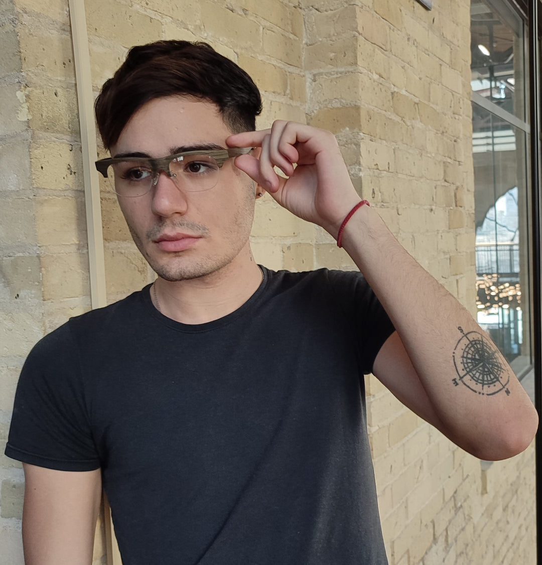 man wearing black oak semi rimless glasses. 